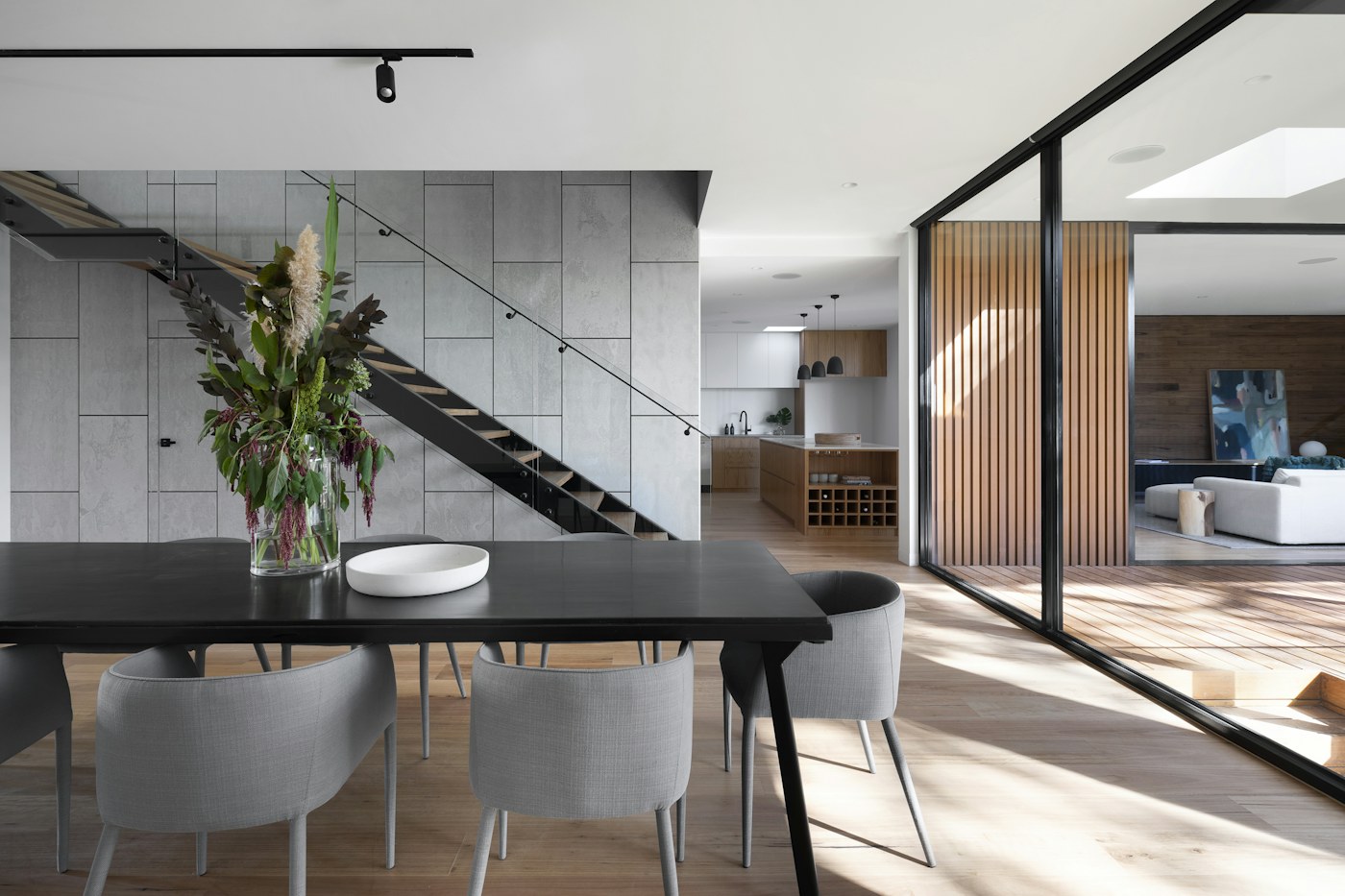 Light-filled residential interior with large windows